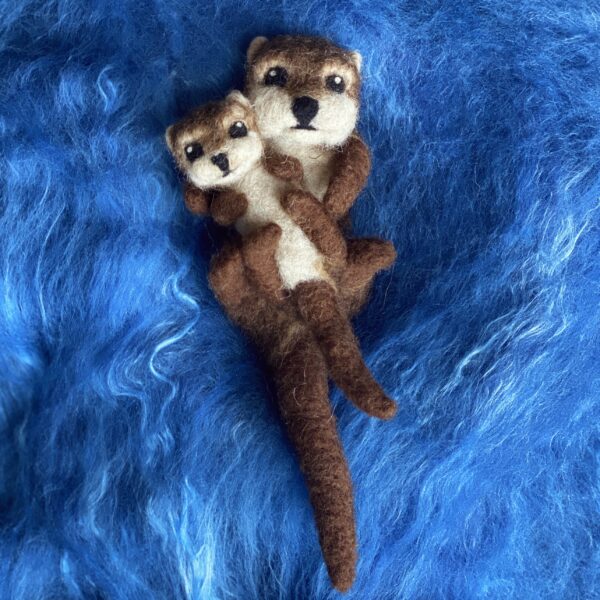 Otter mit Baby – Bild 2